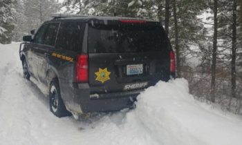 Officers get stuck in snow during welfare check; Good Samaritans from Malo come to rescue