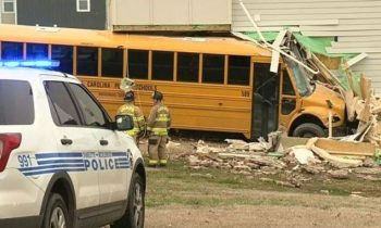 Several injured after a school bus crashes into a building in North Carolina