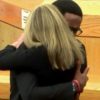 Brother of man killed by Dallas cop gets award for hugging her