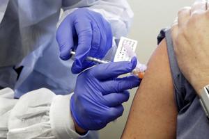 AP Exclusive: Coronavirus vaccine test opens with 1st doses
