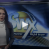 news anchor standing infront of a screen reading SWX