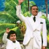 tatu and mr roarke waving to guests on classic fantasy island