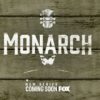 logo for monarch in white paint style block letters with a partial guitar on a wooden background