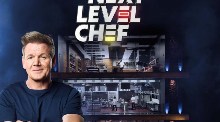 gordon ramsay wearing a dark t-shirt stands in the foreground while the logo for his new show next level chef floats above an image of the three level cooking competition platform used in the show