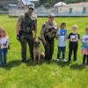 FCSO & ACSO share information with a K-9 unit about D.A.R.E. to students