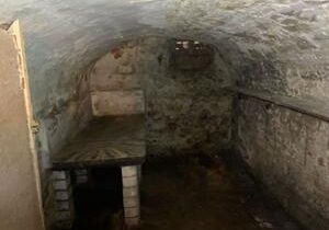 Shop owner discovers Victorian jail cells hidden in her basement