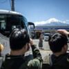 Japan town begins blocking Mt Fuji view from ‘bad-mannered’ tourists