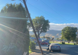 Car crashes into power pole, diverts traffic in Prosser