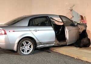 Man arrested in Kennewick after driving into local business