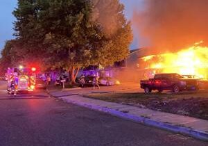 Home in Kennewick catches fire, injures residents