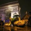 Farmers enter Paris on tractors in protest at trade deal