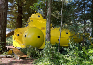 Couple builds Beatles-themed yellow submarine Airbnb