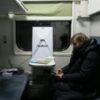 Freezing Kyiv residents seek warmth in trains and tents