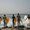 In Dakar fishing village, surfing entices girls back to school